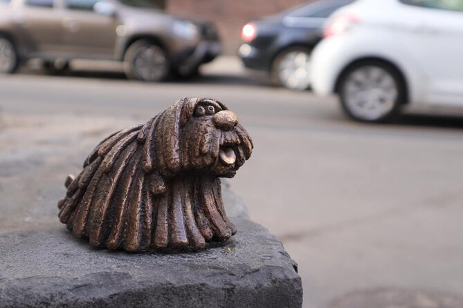 20 Dog-statues in Budapest - a unique tour - The girl and her dog on Vigado Square