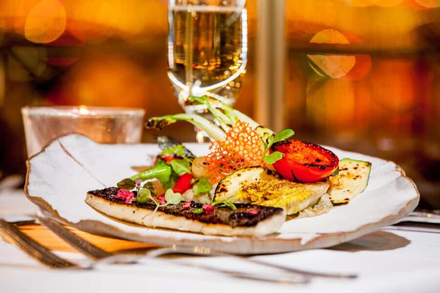 Budapest: 2-Course Dinner for 2 on a Boat Restaurant - Choosing a main dish at the Danube table