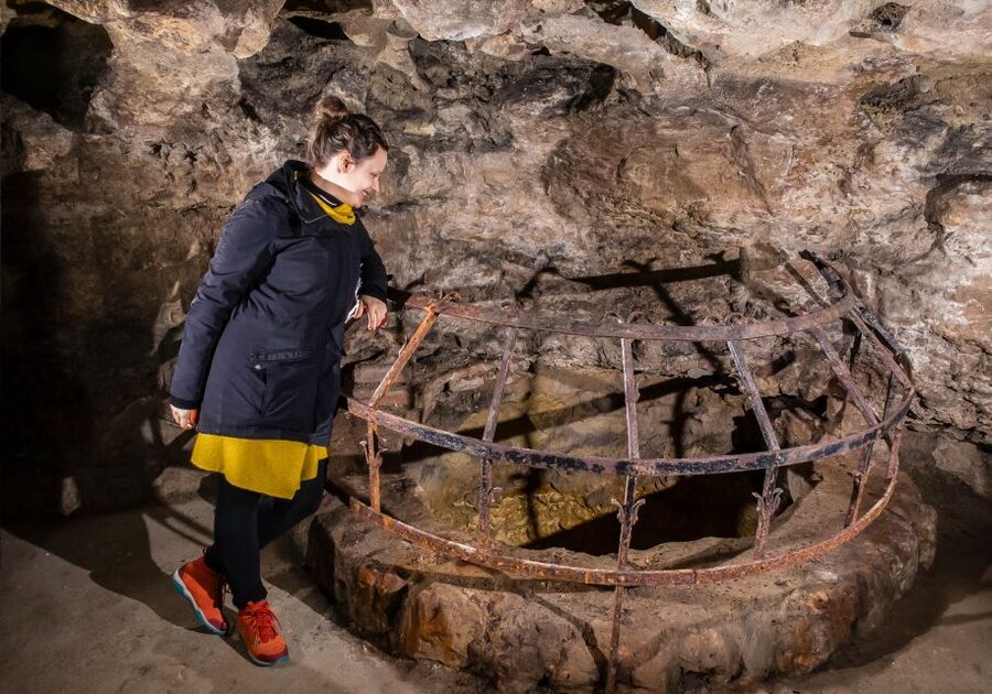 Budapest: Buda Castle Cave Tour - Entering the tunnels beneath Castle Hill