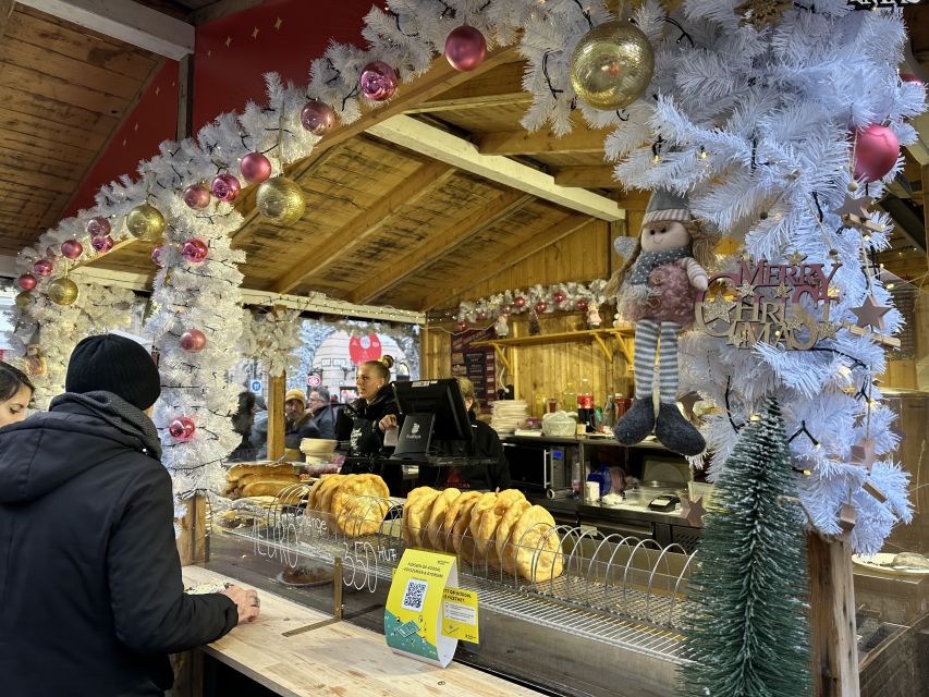Budapest: Christmas Market Guided Walking Tour with Tastings - Tasting chimney cake, mulled wine, and marzipan