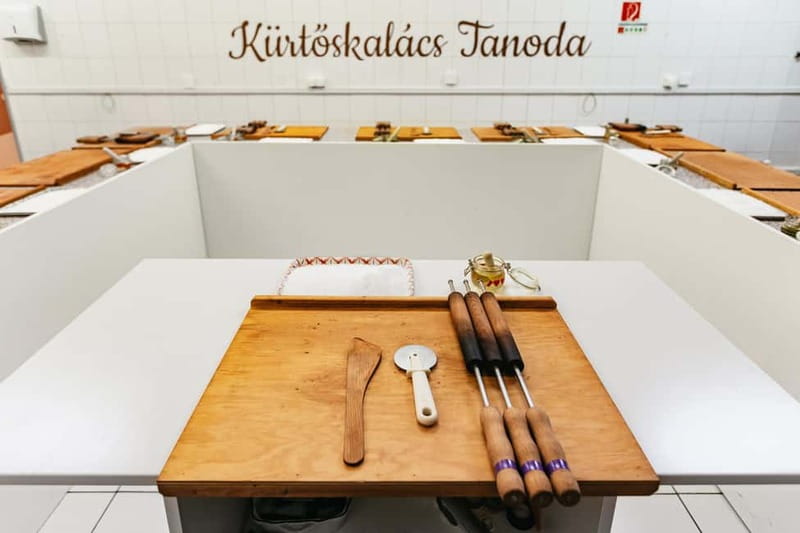 Budapest: Hungarian Chimney Cake Workshop in the City Center - Watching sugar become the crust