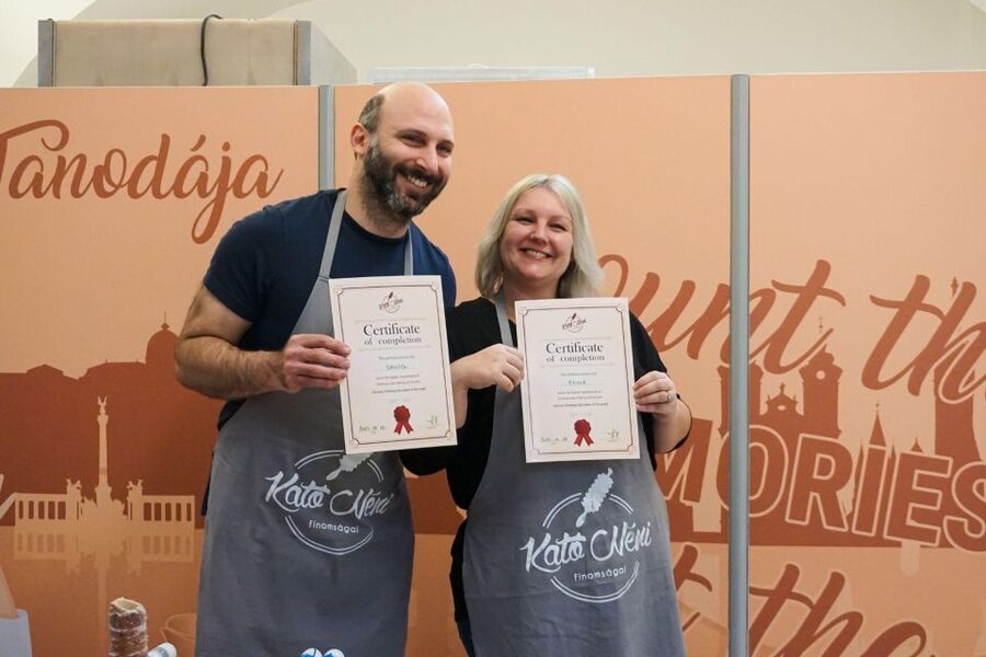 Budapest: Hungarian Chimney Cake Workshop in the City Center - Eating the results and taking them home