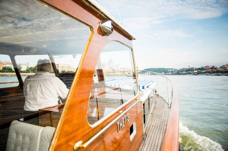 Budapest: Private Danube Yacht Cruise with Welcome Drink - Budapest’s signature view below Margaret Bridge