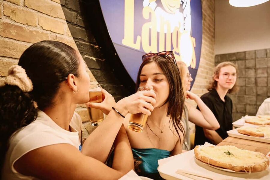Guided Tipsy Food Tour with Drinks Included in Budapest - Walking through District 7 for 30 minutes